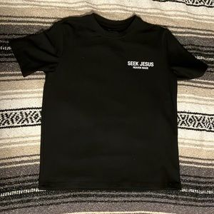 This is a SMALL mens t-shirt it is lightly worn it is also great quality